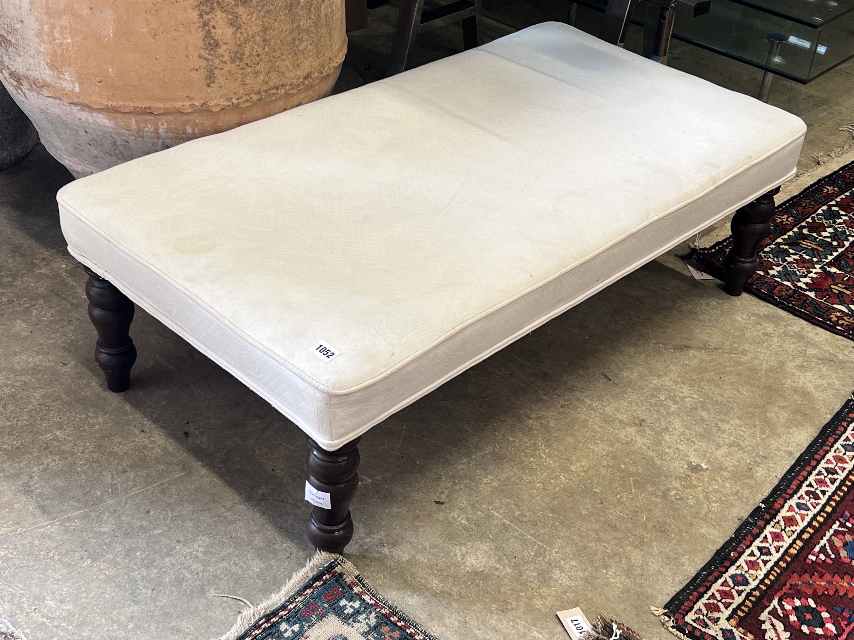 A Victorian style footstool, width 110cm, height 58cm